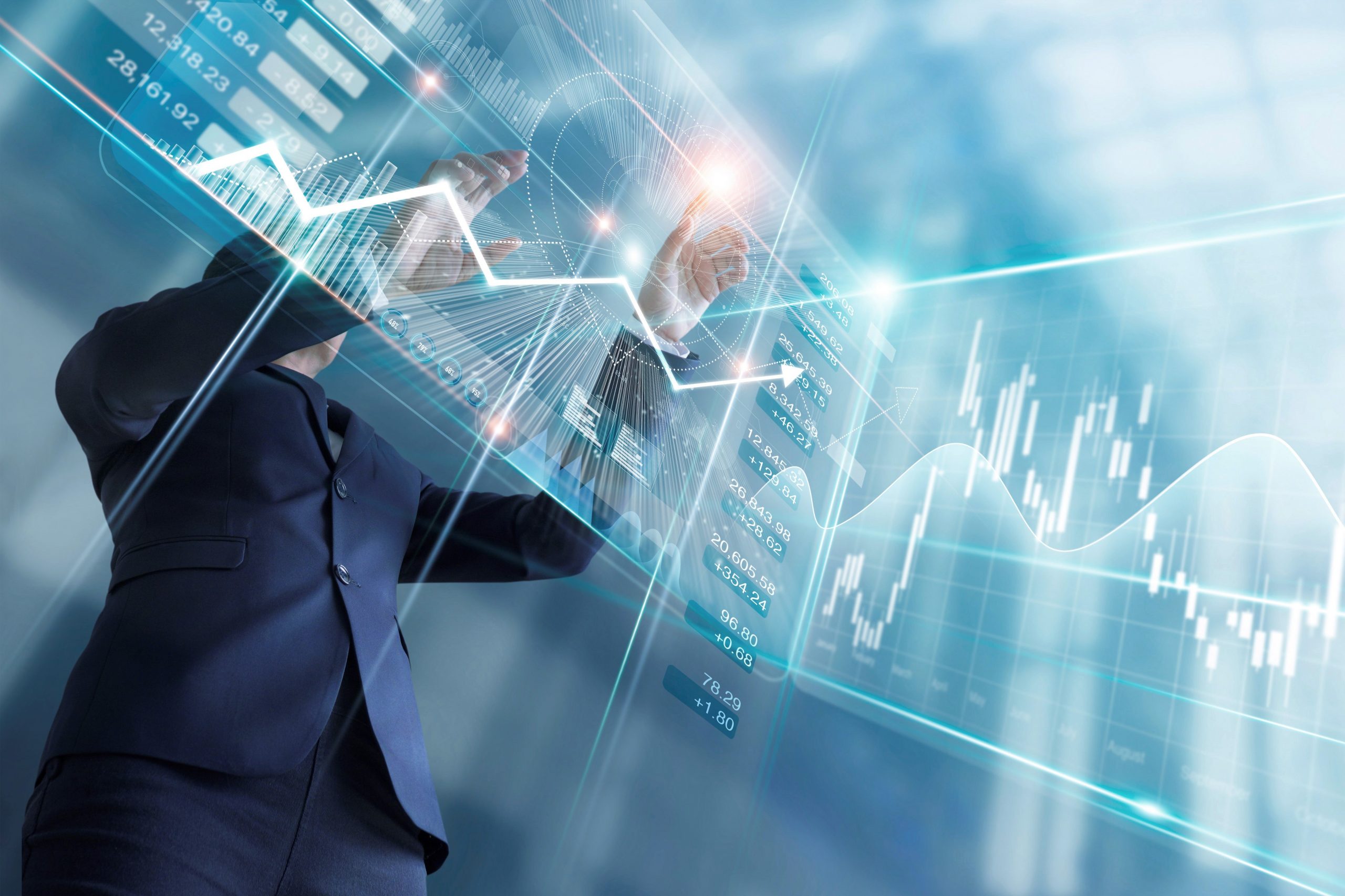 Businessman touching finance growth and graph chart analysing di